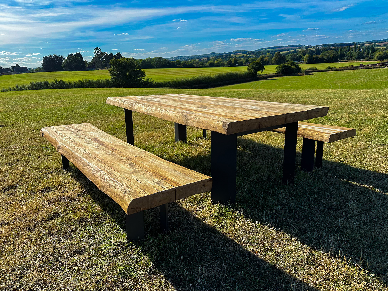 Product photograph of Barbarian Teak Bench Set from The Garden Furniture Centre Ltd