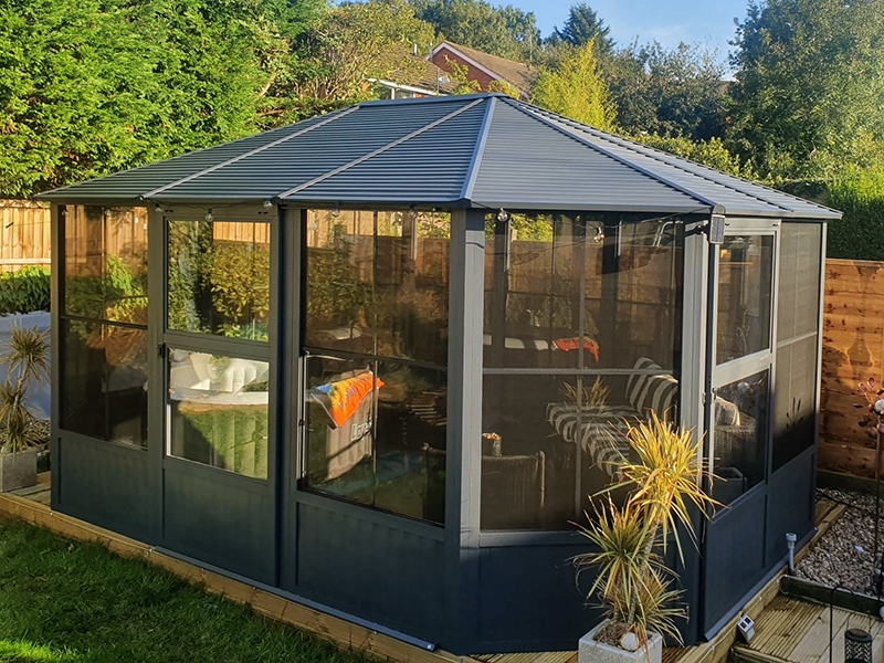 Product photograph of Four Seasons Solarium 12ft X 15ft from The Garden Furniture Centre Ltd