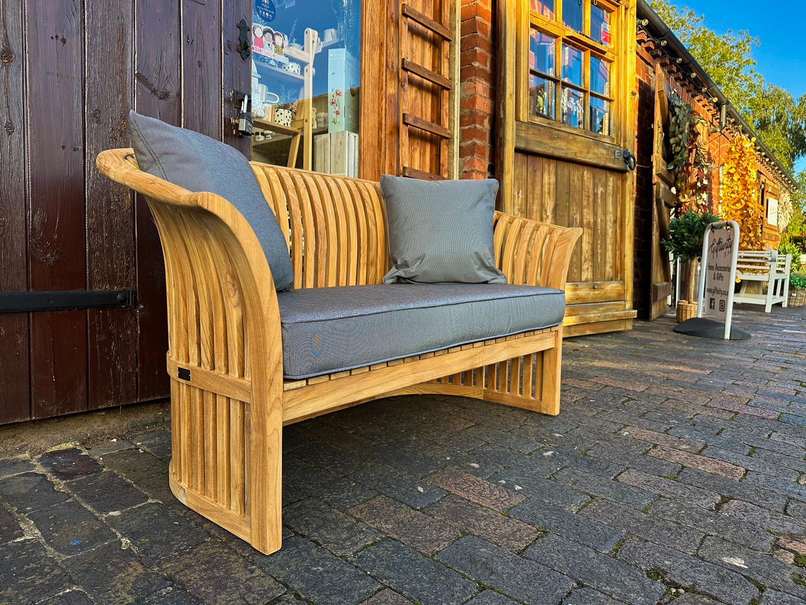 Product photograph of Spring Bench Cushion Black Pinstripe from The Garden Furniture Centre Ltd