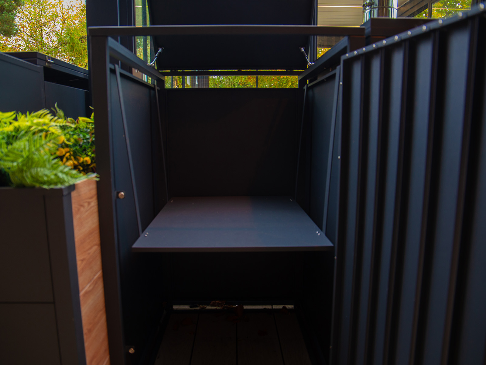 Product photograph of Galvanised Steel Wheelie Bin Shelf from The Garden Furniture Centre Ltd